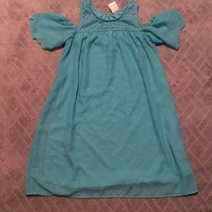 A blue off-the-shoulder dress